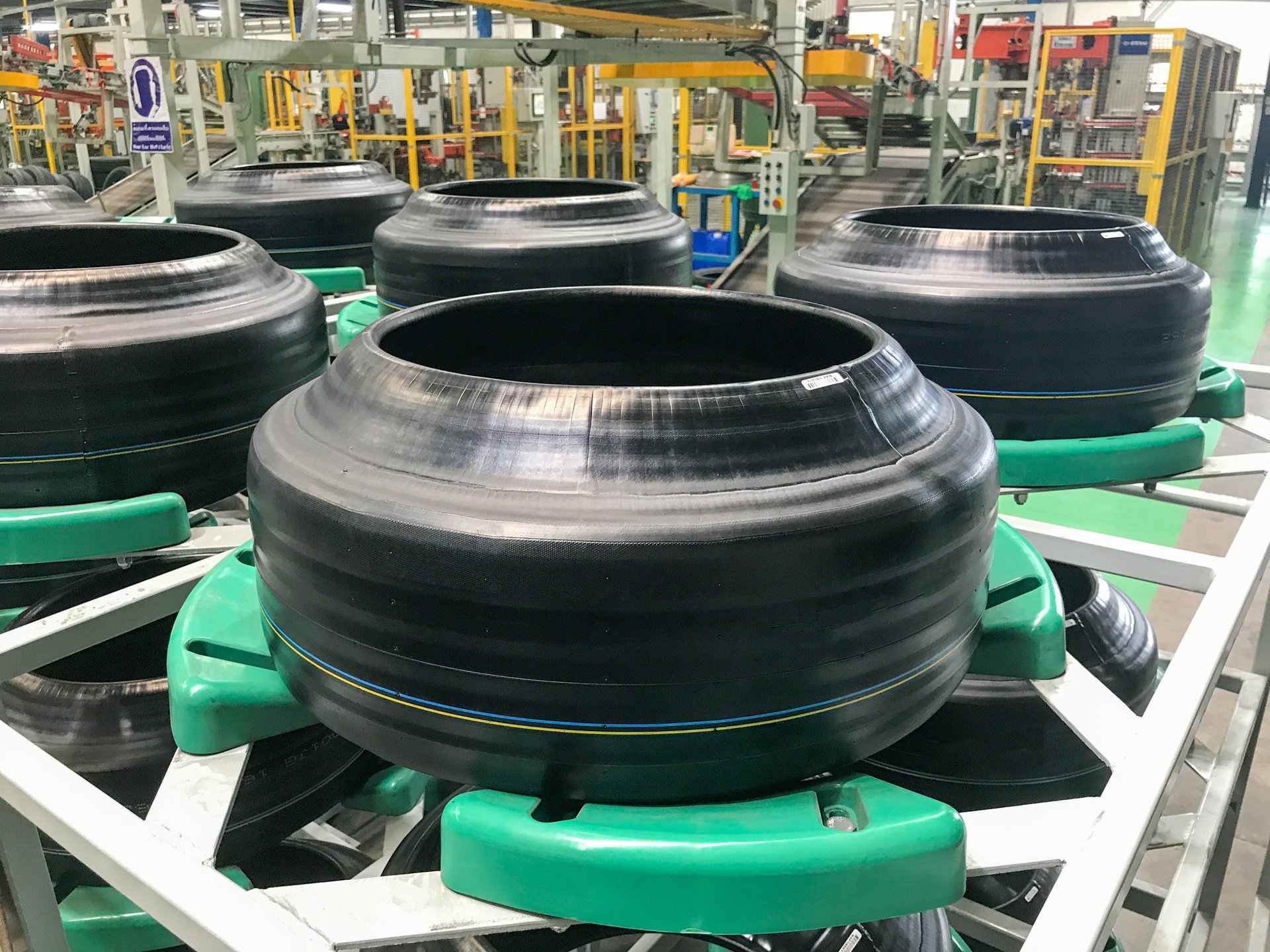 Tire production at factory with close-up manufacturing detail