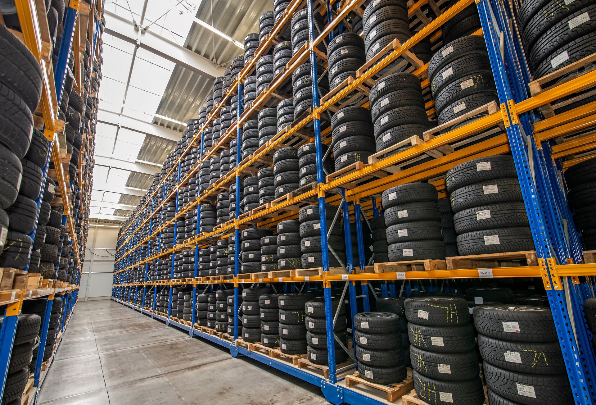 High rack with customer tires in warehouse of a tire dealer