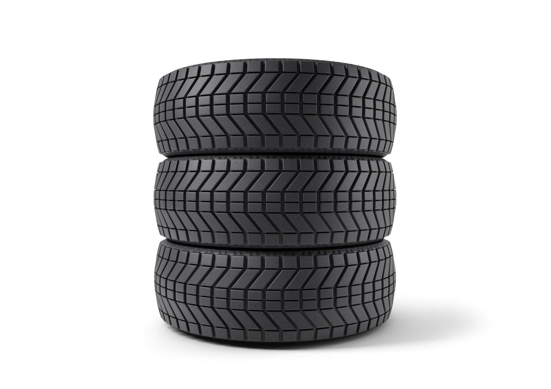 Three black tires stacked on top of each other